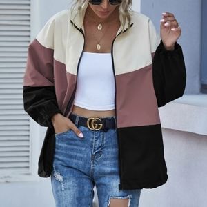 Color block, light weight, over size , fits like an XL, zip up jacket.